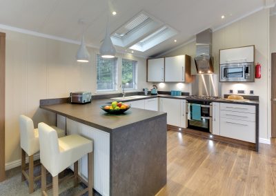 Spacious park home kitchen with granite countertops