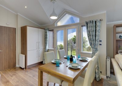 Park home dining area with plenty of natural light